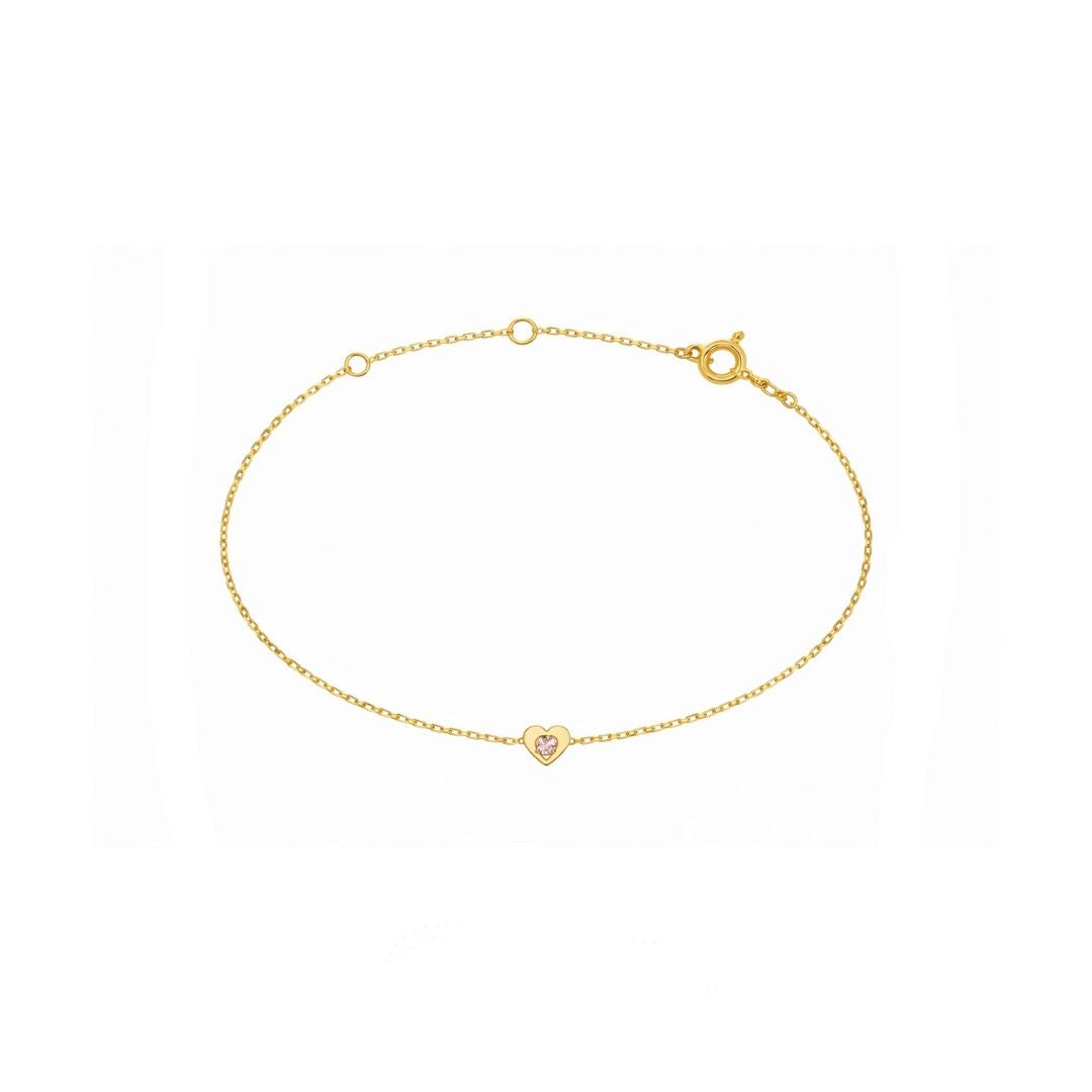 Gold bracelet with a heart charm on a white background, branded 'Australian Diamond Valley'.