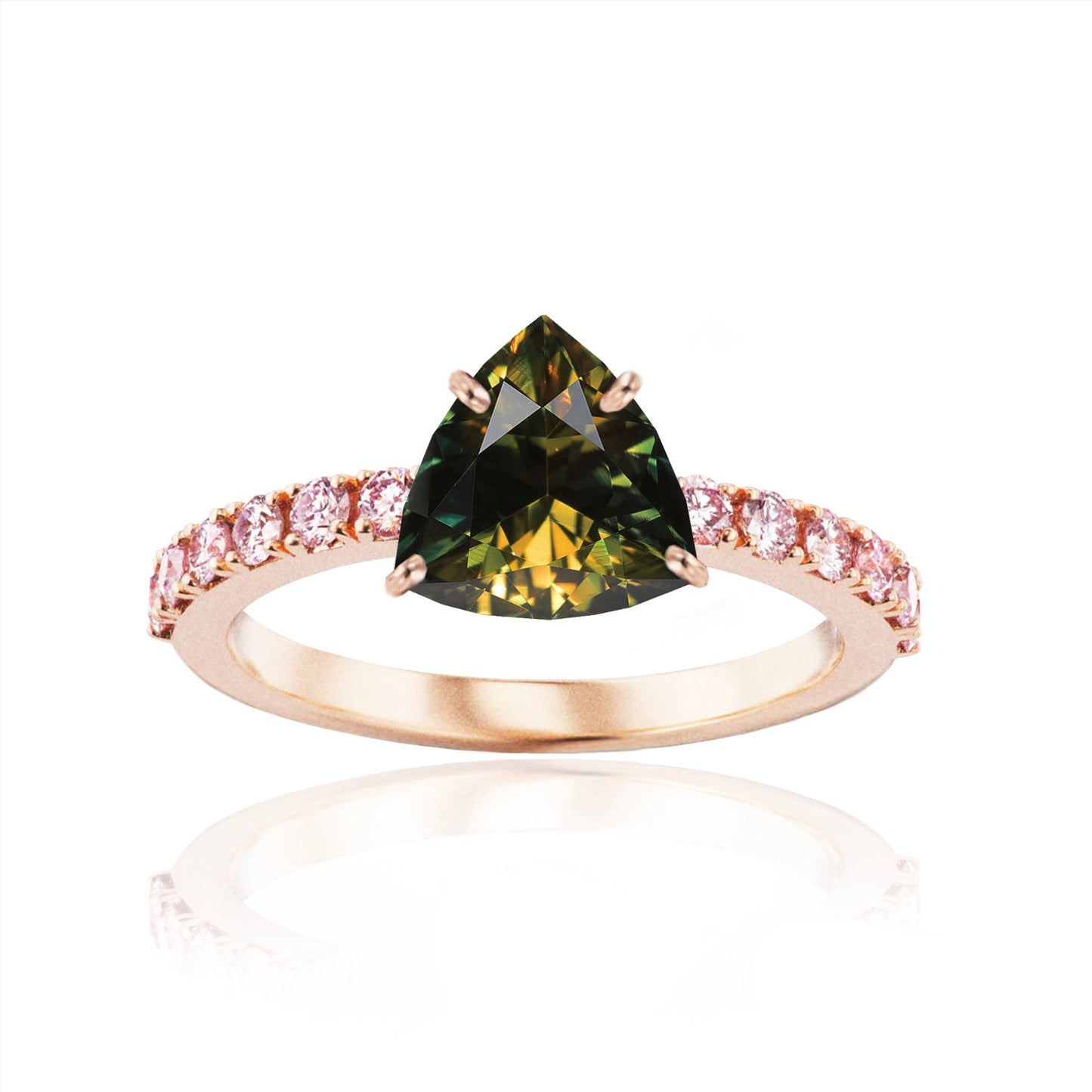 A ring featuring a trinny Australian Parti Sapphire set in a rose gold band, with pink Argyle diamonds along the band.