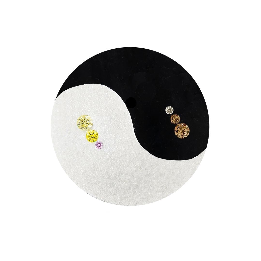 Yin yang design with gemstone earrings on a white background, featuring 'Australian Diamond Valley' branding. Argyle diamonds.