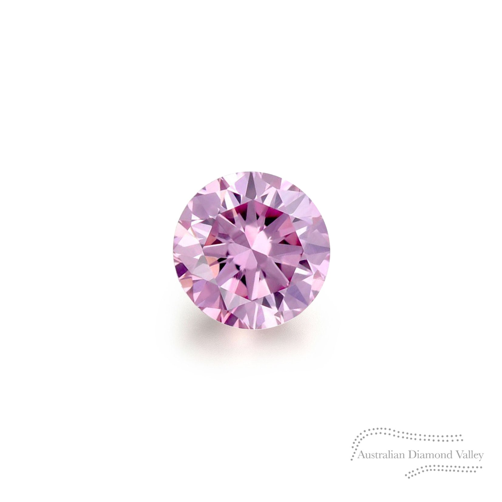 A single pink diamond with a round brilliant cut, presented on a white background, accompanied by a watermark indicating the Australian Diamond Valley.